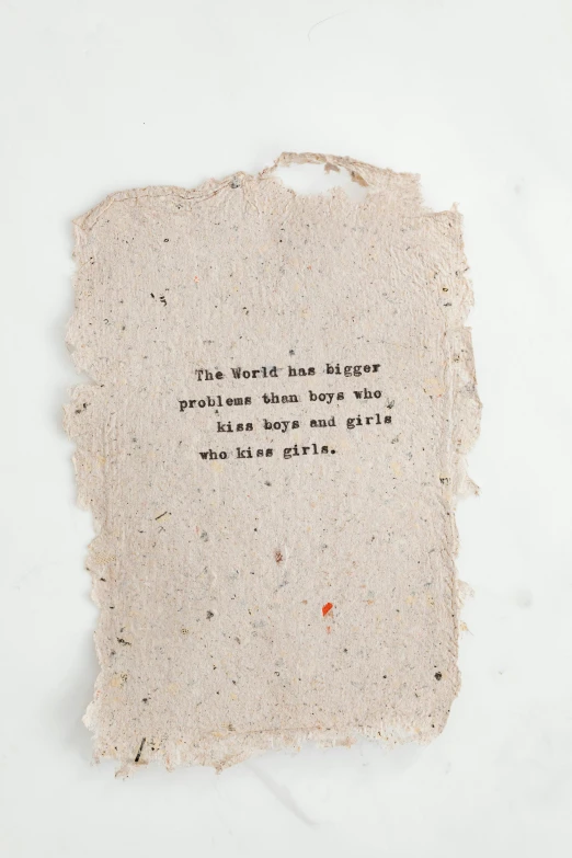 a piece of paper with a quote on it, tall girl, larger than earth, product shot, rags