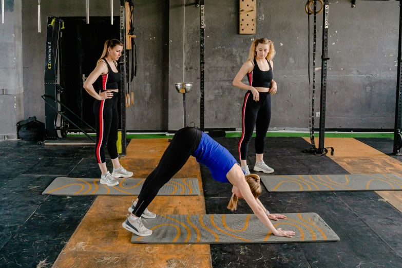 a woman doing a handstand in a crossfit class, pexels contest winner, private press, ouchh and and innate studio, quadruped, profile image, thumbnail