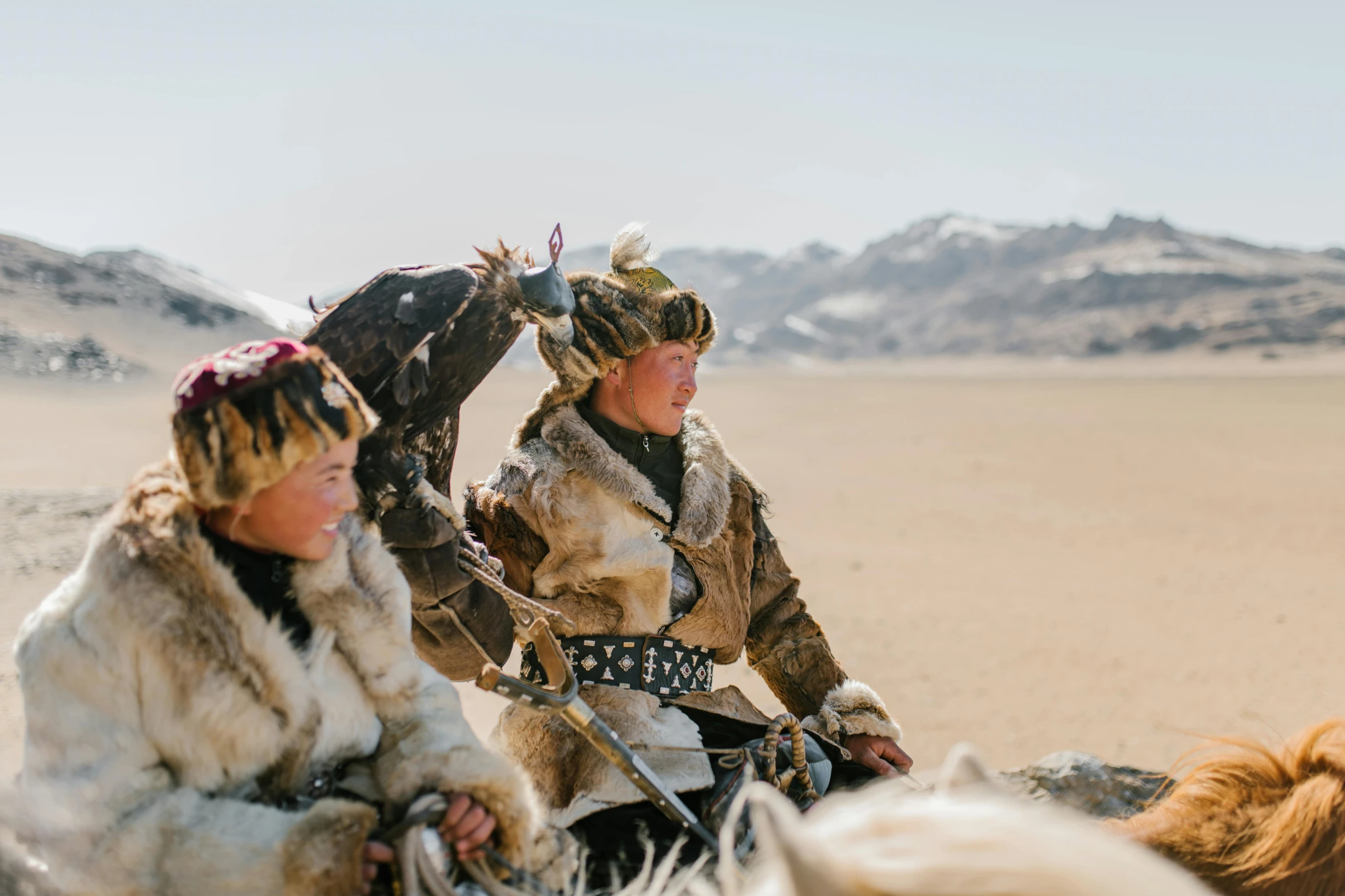 a couple of people riding on the back of a horse, a portrait, trending on unsplash, hurufiyya, wearing intricate fur armor, mongolia, avatar image