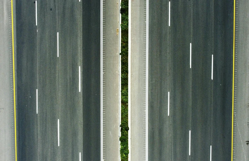 a couple of roads that are next to each other, inspired by Andreas Gursky, pexels contest winner, conceptual art, split in half, concrete, ilustration, green lines