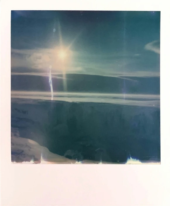 a polar bear standing on top of a snow covered slope, a polaroid photo, by Nathalie Rattner, light and space, solar storm, icebergs, (snow), sunfaded