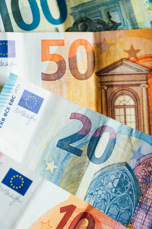 a pile of money sitting on top of a table, european union, thumbnail, teaser, leaked image