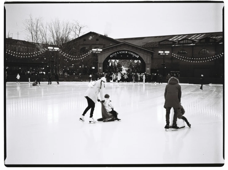 a group of people skating on an ice rink, a black and white photo, by Dan Frazier, medium format. soft light, pixar studios, 🌻🎹🎼, at the park