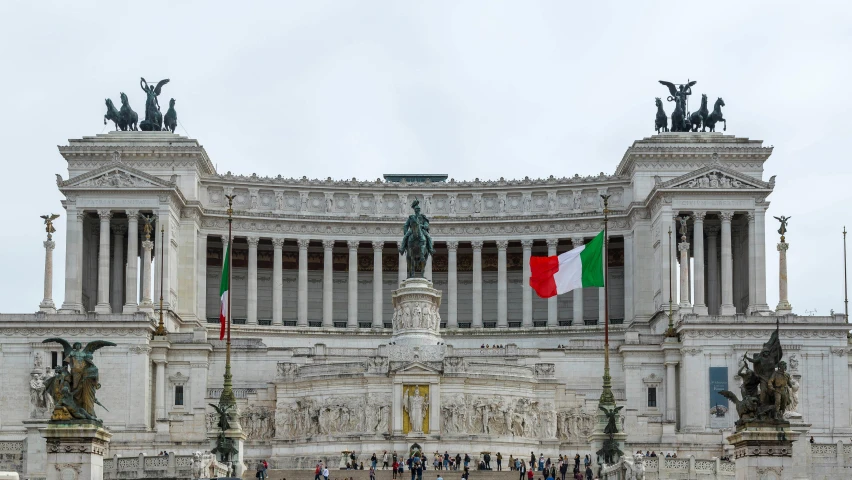 a group of people that are standing in front of a building, a statue, by Carlo Martini, pexels contest winner, neoclassicism, italian flag, panoramic, square, color image