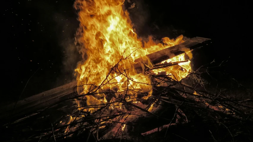 a fire that is burning in the dark, pexels contest winner, bonfire, avatar image, thumbnail, a wooden