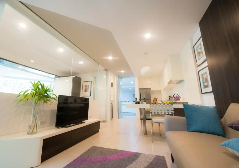 a living room filled with furniture and a flat screen tv, altermodern, manly, ross tan, bright sky, apartments