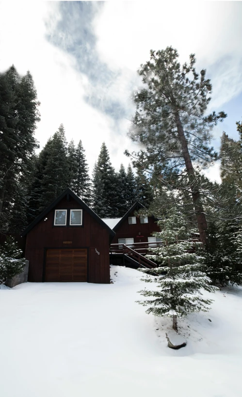 a cabin sitting in the middle of a snow covered forest, profile image, listing image, medium, outdoor photo