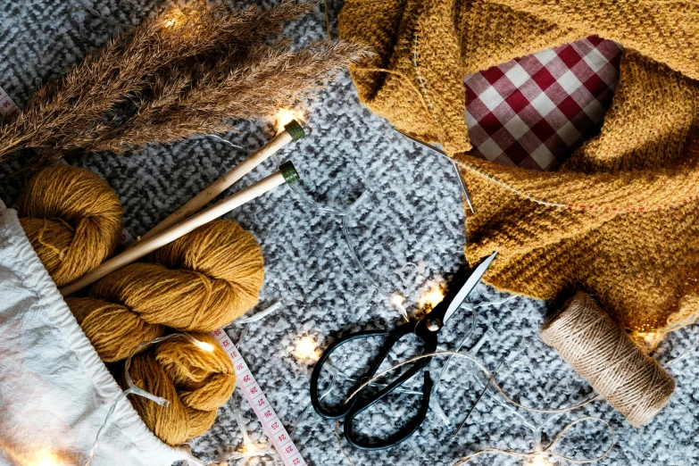 a pair of scissors, twine of twine of twine of twine of twine of twine of twine of twine, by Julia Pishtar, trending on pexels, arts and crafts movement, cozy calm! fabrics textiles, winter vibes, ocher, fully decorated