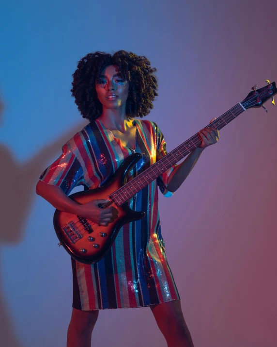 a woman in a dress holding a guitar, pexels contest winner, funk art, ashteroth, nonbinary model, bassist, translucent