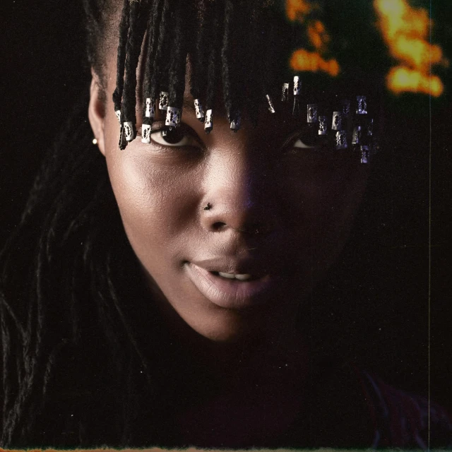 a close up of a person with long hair, an album cover, unsplash, afrofuturism, black bangs, short dreadlocks with beads, grainy movie still, black teenage girl