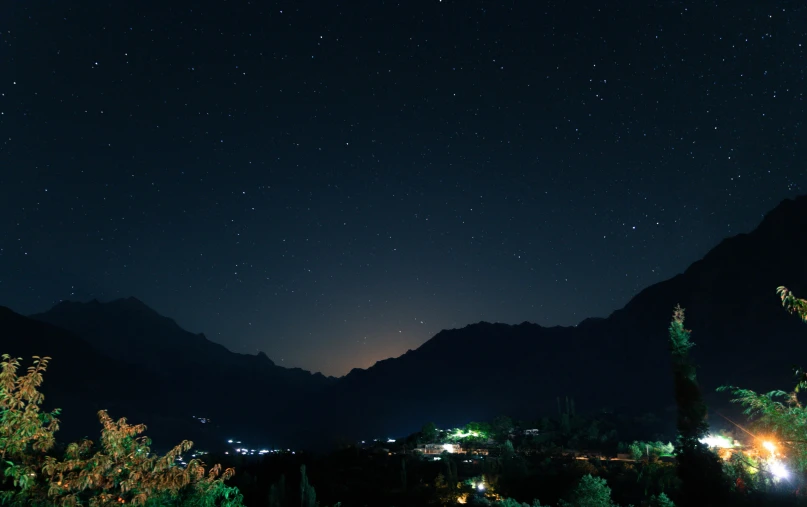 a night sky filled with lots of stars, a picture, pexels contest winner, hurufiyya, uttarakhand, nightime village background, very dark with green lights, larapi