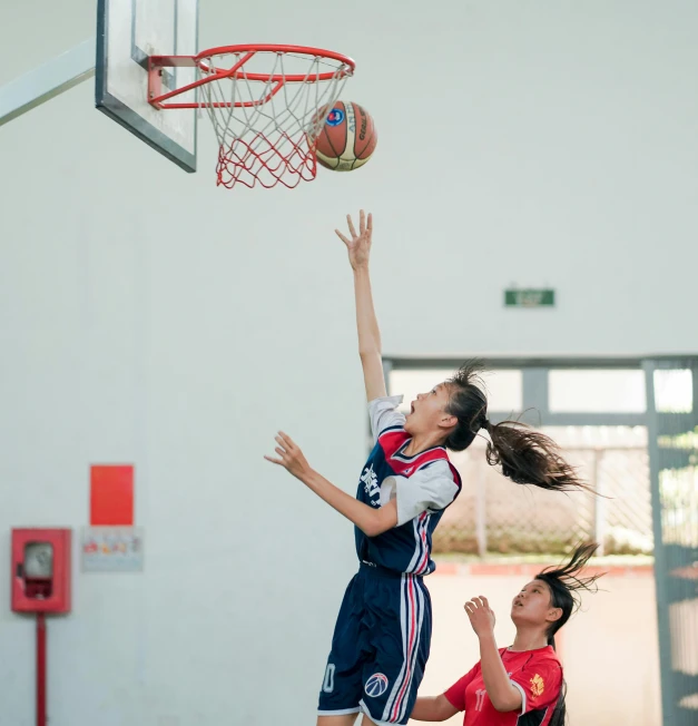 a couple of women playing a game of basketball, inspired by Mia Brownell, trending on dribble, danube school, profile image, dilraba dilmurat, high midair shot, f / 1 1. 0