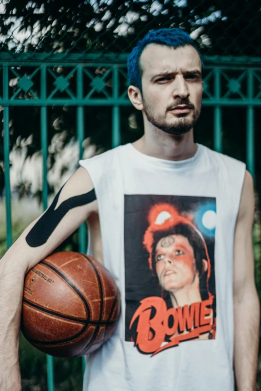 a man with blue hair holding a basketball, an album cover, dribble contest winner, bauhaus, wearing : tanktop, sport t-shirt, profile image, andrew garfield