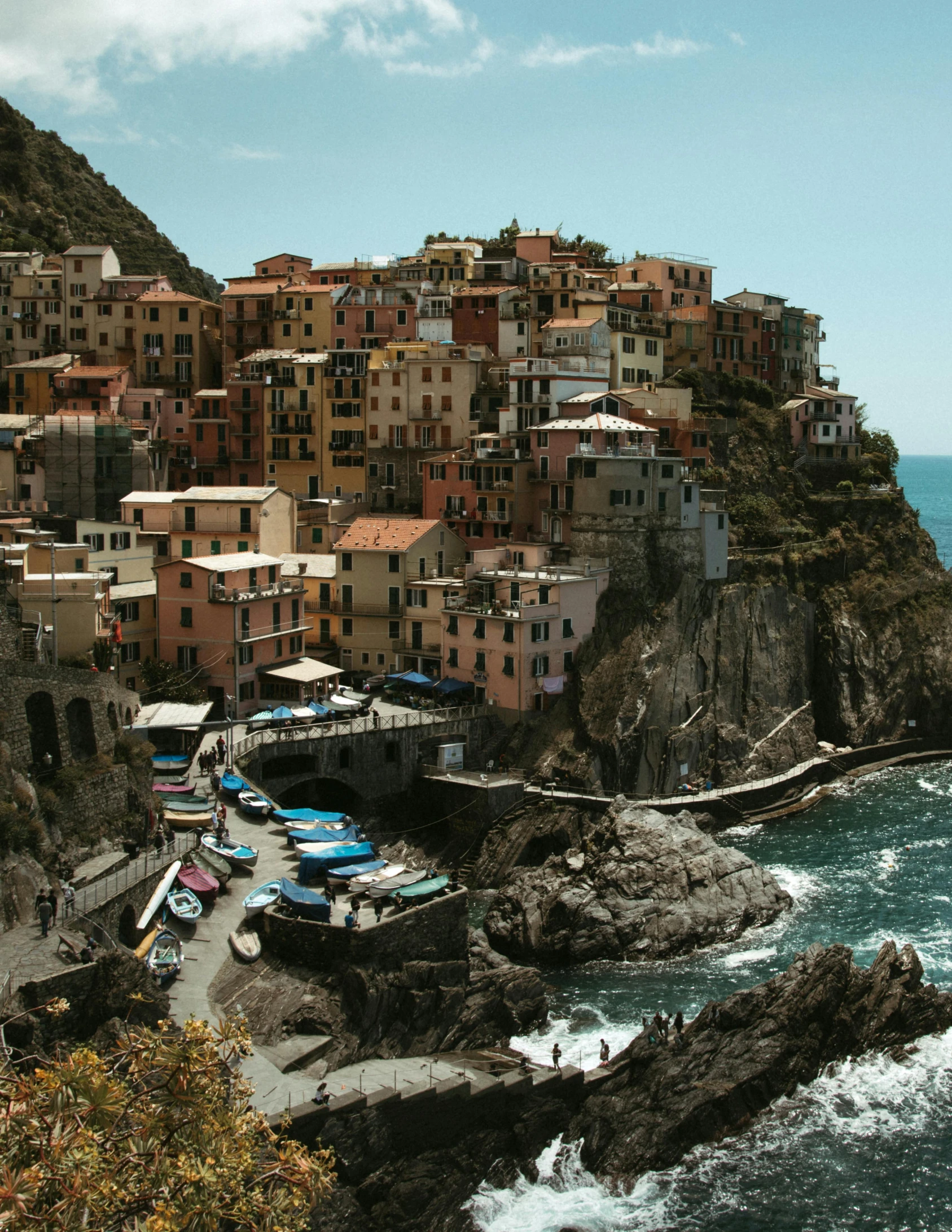 a group of people standing on top of a cliff next to the ocean, pexels contest winner, renaissance, quaint village, italian style, thumbnail, multiple stories