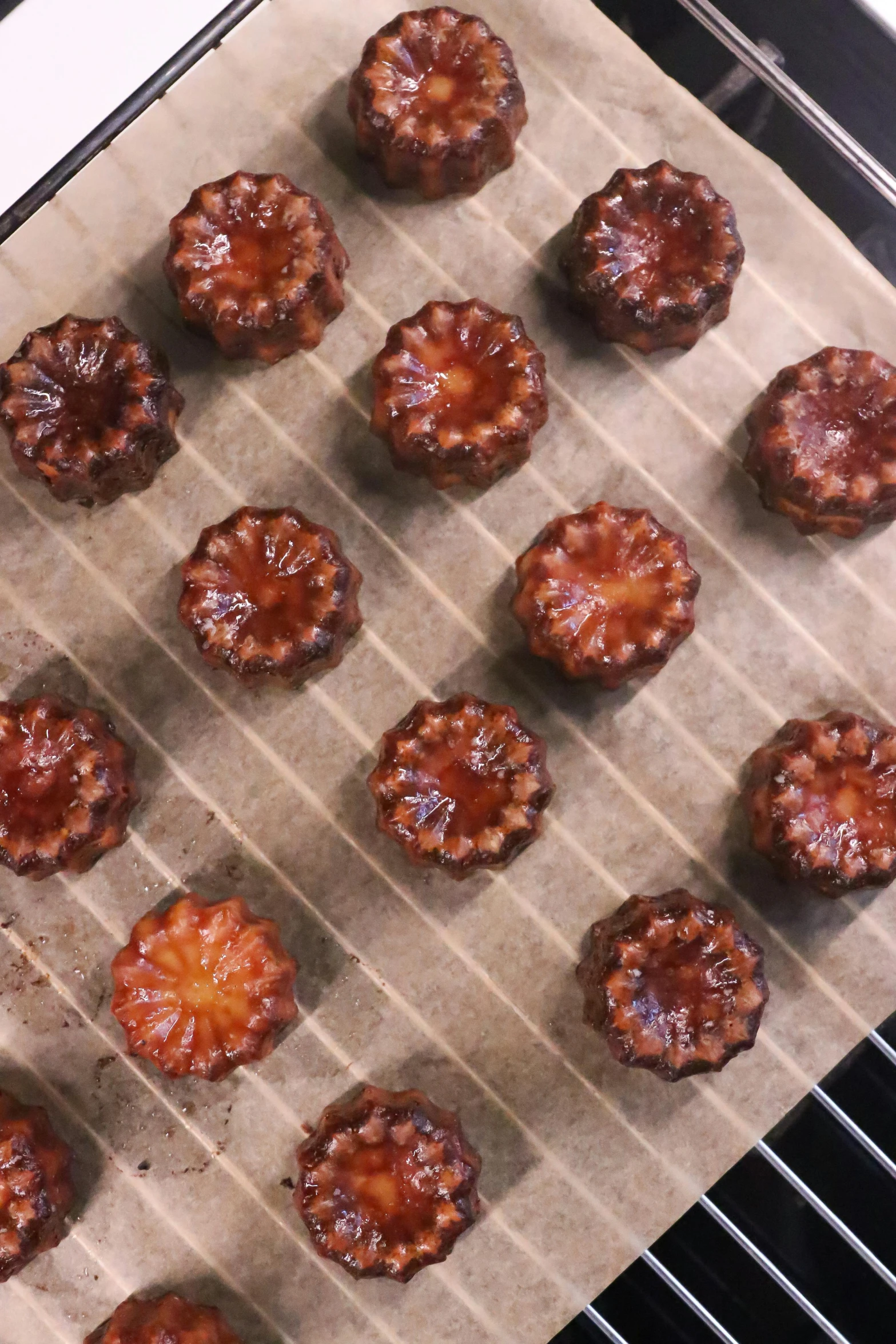 a pan filled with meatballs sitting on top of a stove, inspired by Richmond Barthé, reddit, hurufiyya, covered with pink marzipan, orange fluffy spines, hand carved brown resin, thumbnail