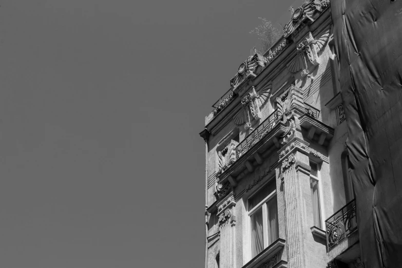 a black and white photo of a tall building, inspired by Piranesi, pexels contest winner, neoclassicism, lviv, detailed medium format photo, rome, photo high definition