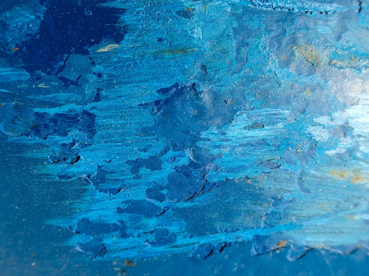 a close up of a painting of blue paint, inspired by Mordecai Ardon, pexels, analytical art, quixel textures, blue reflections, bottom - view, warm shades of blue