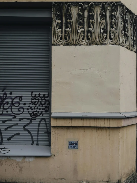 a man riding a skateboard up the side of a building, an album cover, by Pablo Rey, trending on unsplash, graffiti, style of atget, very sparse detail, paris 2010, - signature