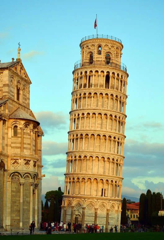 a couple of tall buildings sitting next to each other, a picture, by Carlo Martini, renaissance, the leaning tower of pizza, bathed in golden light, slide show, geology