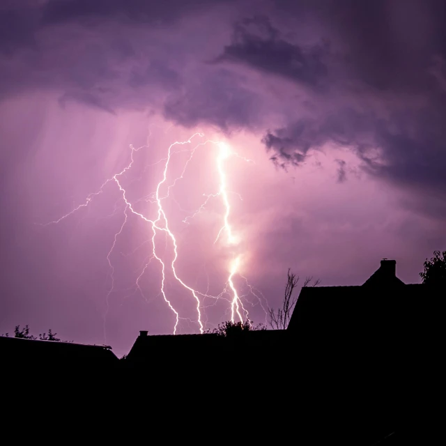 a lightning bolt hitting through a purple sky, by Jesper Knudsen, pexels contest winner, happening, light breaks through the roofs, hd footage, storm in the evening, 4 0 0 mm