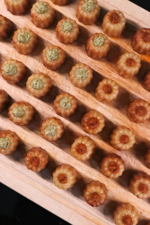 a close up of a tray of food on a table, green sea urchin, in formation, minarets, handcrafted