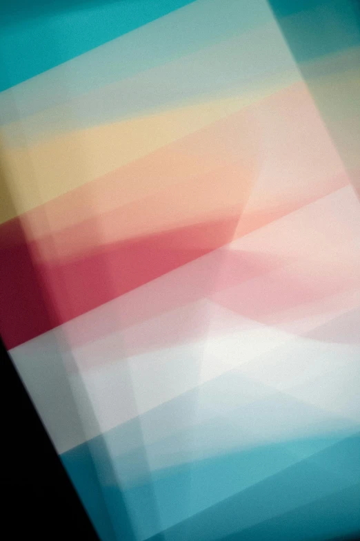 a close up of a cell phone with a blurry background, by Larry Zox, geometric abstract art, translucent pastel panels, diagonal composition, medium format. soft light, digital art - n 5