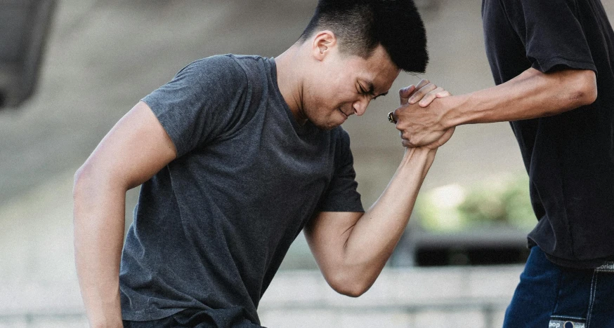 a couple of men standing next to each other, pexels contest winner, sweating hard, kneeling, asian male, heart rate