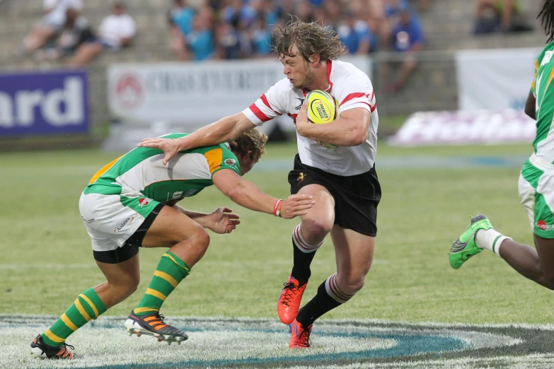 a group of men playing a game of rugby, 8 k greg rutkowski, professional photo, a green, black and yellow and red scheme