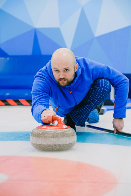 a man about to throw a curling stone, by Julia Pishtar, ivan shishk, soft surfaces, looking towards camera, full colour