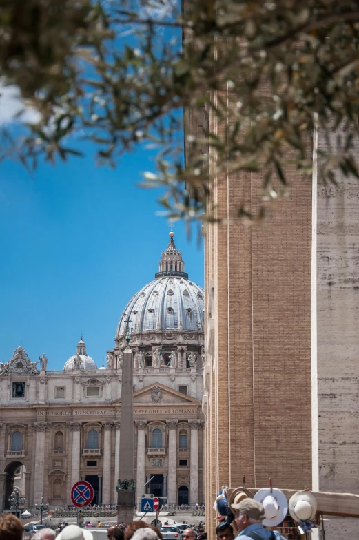 a crowd of people standing in front of a building, by Cagnaccio di San Pietro, trending on unsplash, john paul ii, seen from a distance, dome, profile image