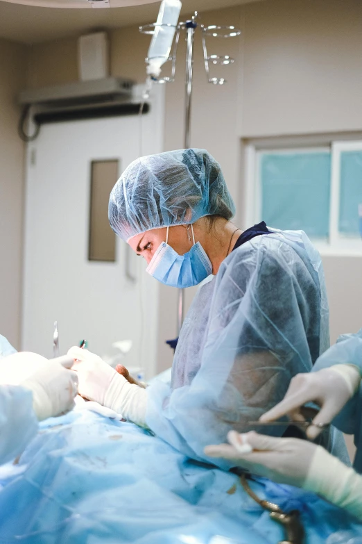 a group of surgeons working on a patient, by Rachel Reckitt, happening, surgical supplies, profile image, thumbnail