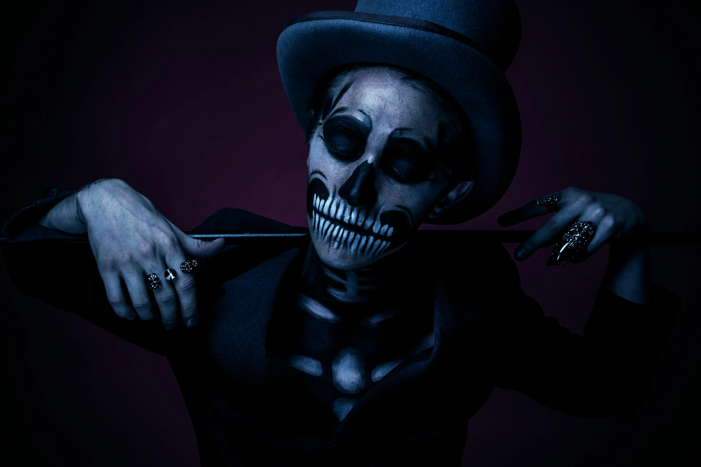 a skeleton in a top hat holding a baseball bat, by Emma Andijewska, pexels contest winner, lowbrow, blue body paint, dark face, super realistic, ad image