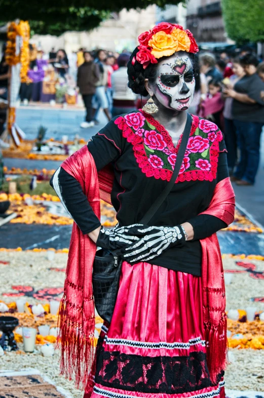 a woman in a day of the dead costume, a photo, by Meredith Dillman, pexels contest winner, split near the left, square, journalism photo, crimson themed