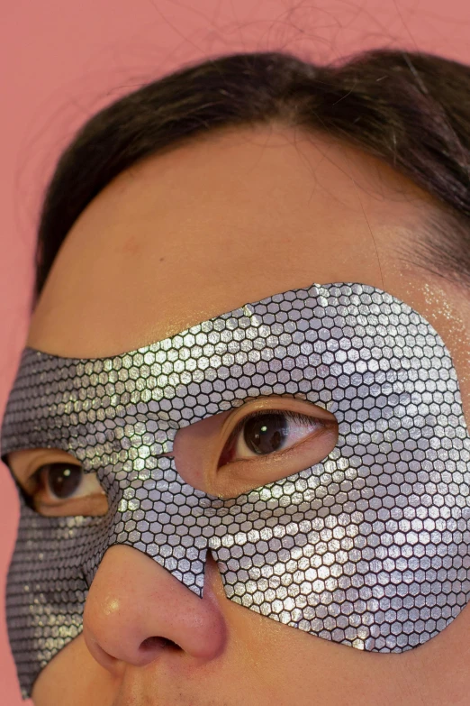 a close up of a person wearing a mask, inspired by Okuda Gensō, holography, scaly skin, grey, burka, skincare