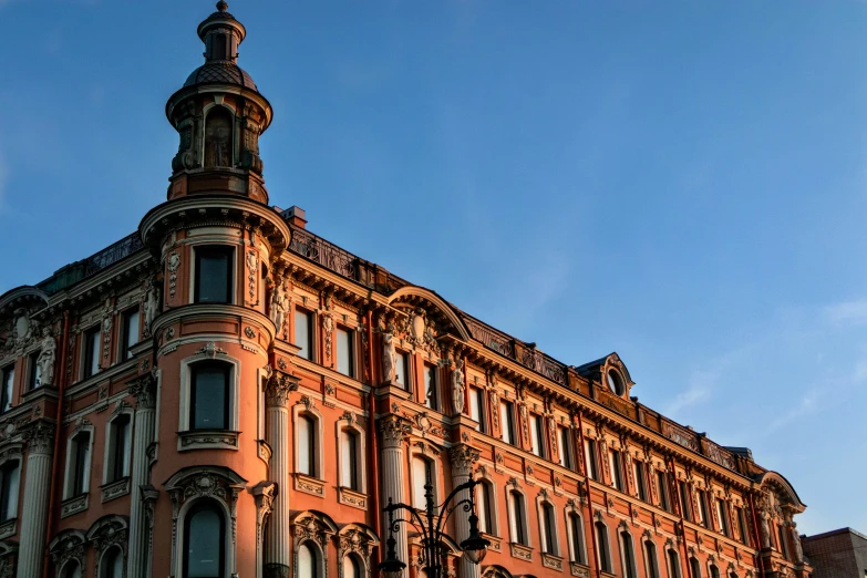 a tall building with a clock on top of it, by Andrei Kolkoutine, pexels contest winner, neoclassicism, pink golden hour, saint petersburg, profile image, square