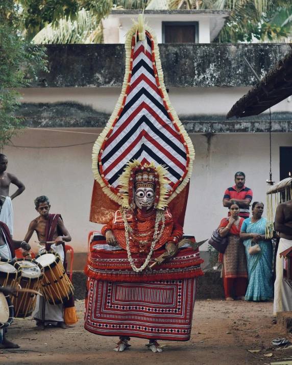 a group of people that are standing in the dirt, a statue, pexels contest winner, bengal school of art, with kerala motifs, an altar of a temple, thumbnail, female dancer