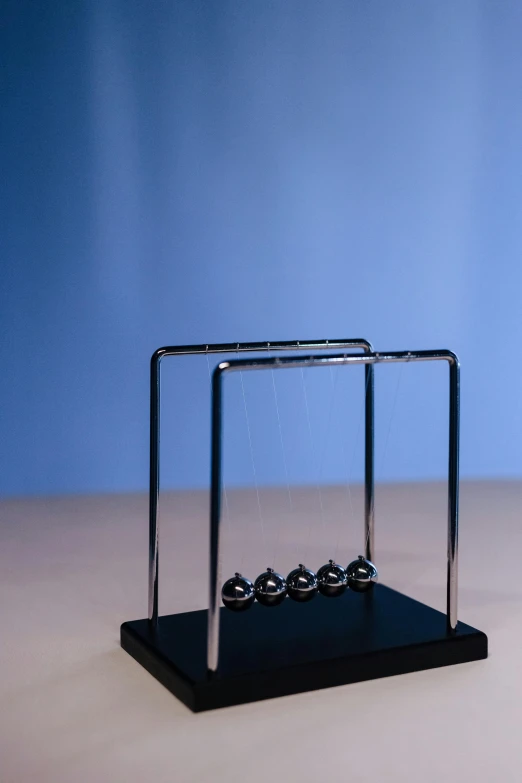 a newton newton newton newton newton newton newton newton newton newton newton newton newton newton newton newton newton newton newton newton newton newton newton newton newton newton newton, an abstract sculpture, by Kazimierz Wojniakowski, unsplash, newton's cradle, toy guillotine, tabletop model, at a slightly elevated level