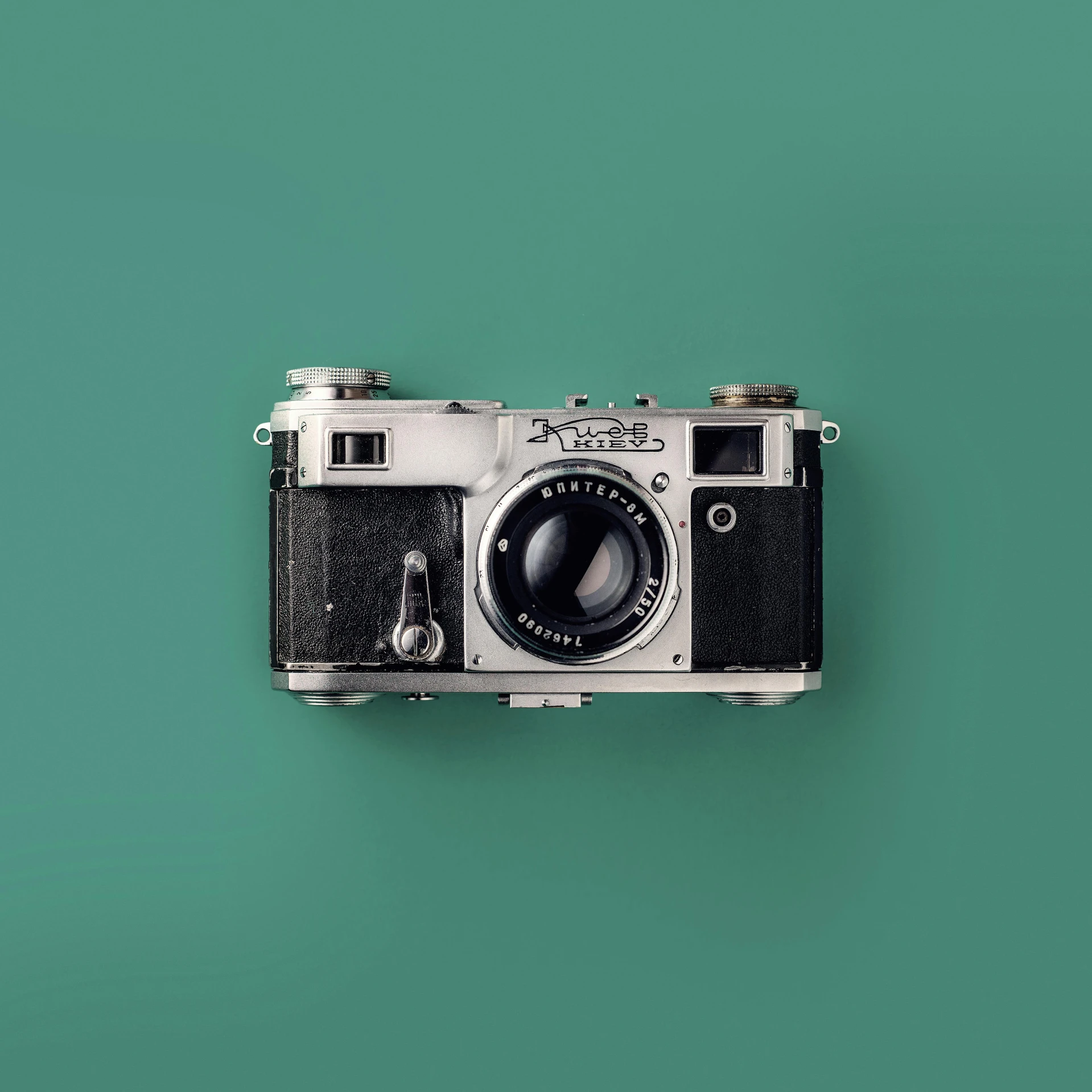 an old camera on a green background, by Adam Marczyński, teal aesthetic, asset on grey background, professional image, on a canva