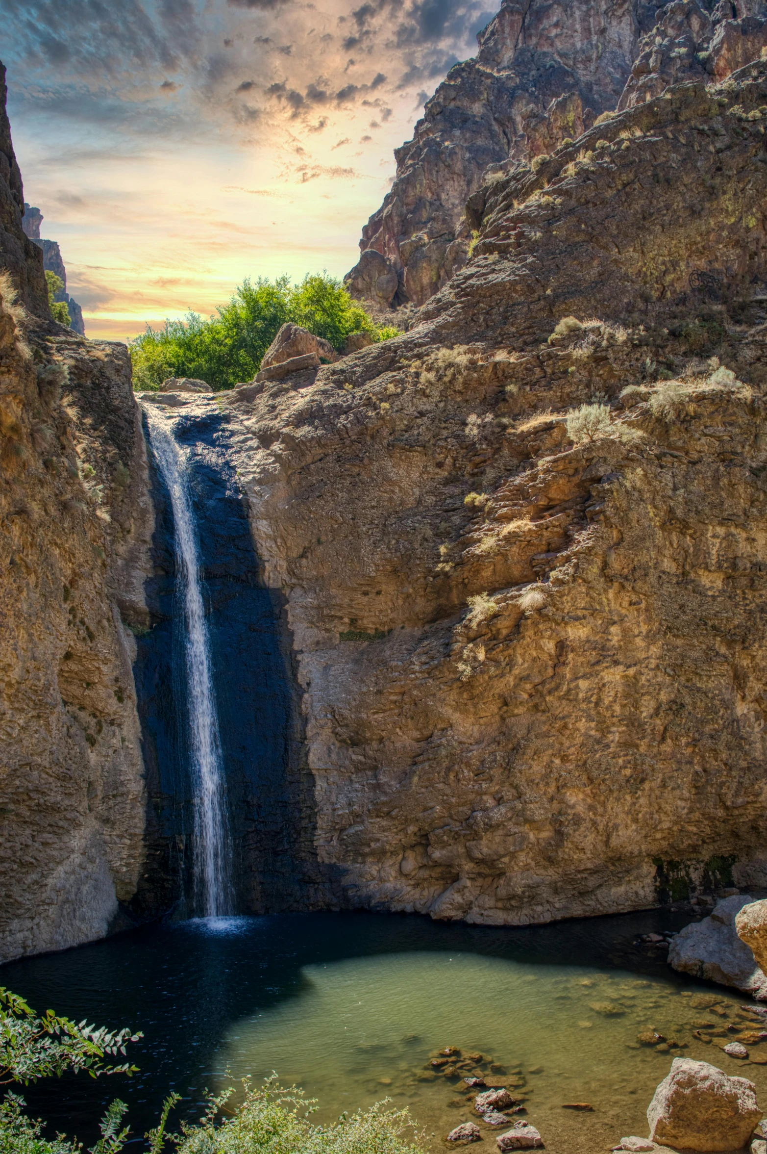 a waterfall in the middle of a canyon, les nabis, in a desert oasis lake, hot springs hidden cave, explore, may