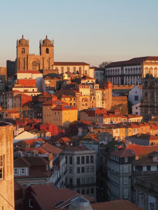 a view of a city from the top of a building, inspired by Almada Negreiros, pexels contest winner, renaissance, dappled in evening light, profile image, square, high quality picture