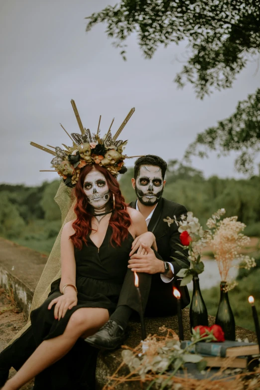 a man and a woman sitting next to each other, pexels contest winner, international gothic, el dia los muertos!, themed after wine, profile image, seasonal