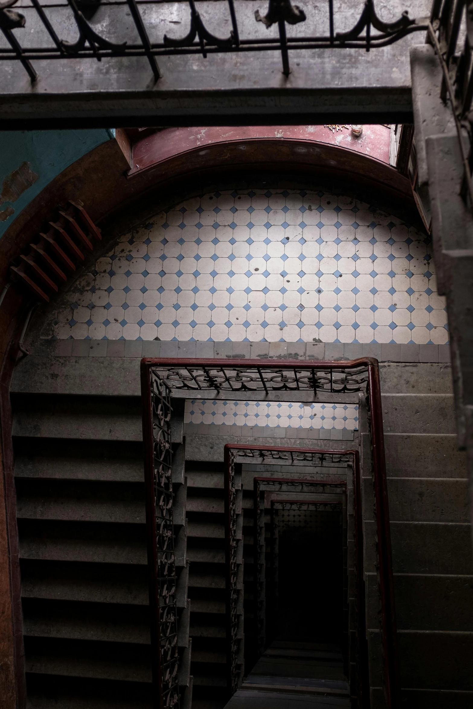 a set of stairs going up to the top of a building, inspired by M. C. Escher, art nouveau, tiled room squared waterway, alessio albi, intricate environment - n 9, dark photo