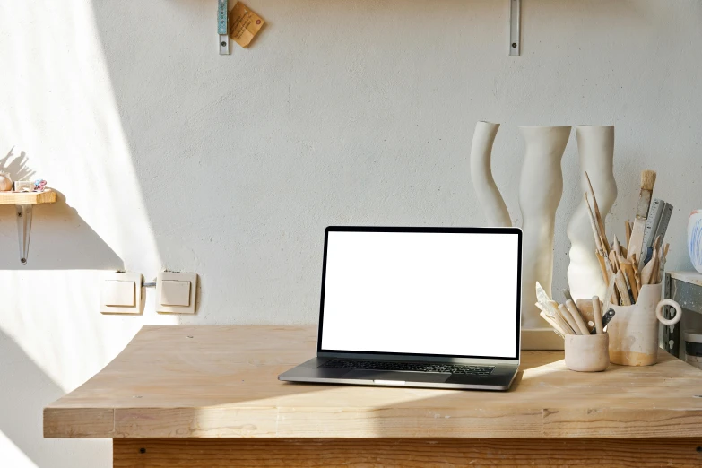 a laptop computer sitting on top of a wooden table, a computer rendering, unsplash, light and space, whitespace, backlit, rectangle, no - text no - logo