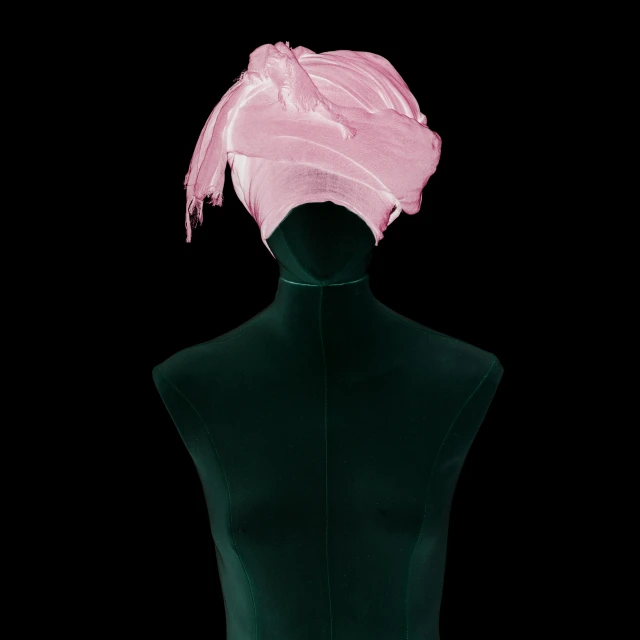 a mannequin with a pink turban on top of it, inspired by Anna Füssli, conceptual art, vantablack cloth technology, mapplethorpe, pink and green, ede laszlo