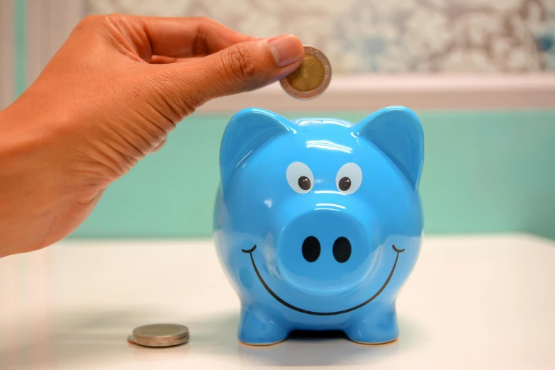 a person putting a coin into a blue piggy bank, pixabay, square, happy big chungus, photograph credit: ap, elliot alderson