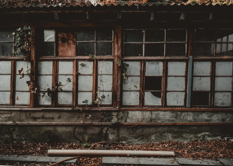 a bench sitting in front of a run down building, inspired by Elsa Bleda, pexels contest winner, shin hanga, japanese glass house, old asian village, background image, windows and walls :5