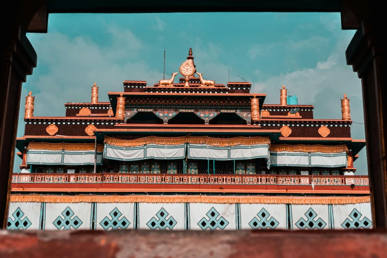 a large building with a clock on top of it, unsplash contest winner, cloisonnism, omar shanti himalaya tibet, in balcony of palace, profile image, thumbnail