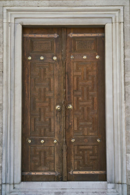 a pair of wooden doors in a stone building, by Sven Erixson, romanesque, golden inlays, naples, lots of details, chocolate