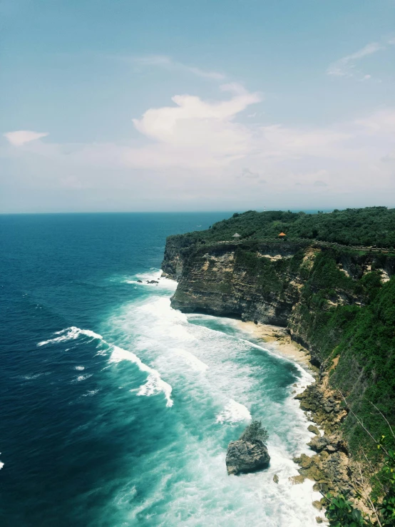 a large body of water next to a cliff, happening, bali, view of sea, flatlay, slide show