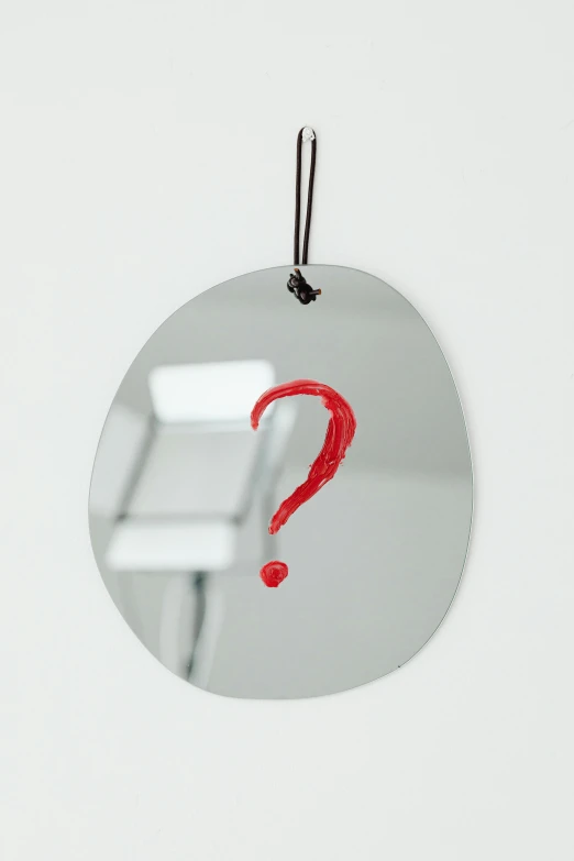 a mirror with a red question mark on it, inspired by Patrick Caulfield, unsplash, tissue ornament, detailed product image, no logo, high quality photo